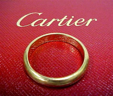 cartier ring marked 750